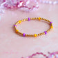 purple & gold blakely beaded bracelet