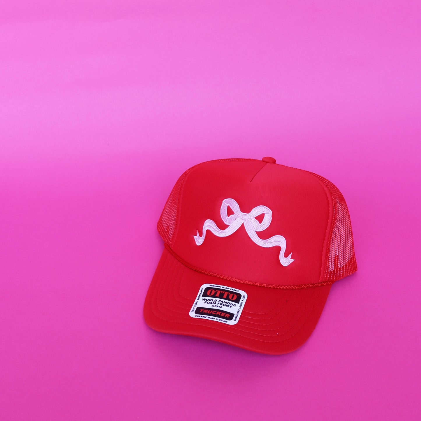 red bow trucker hat