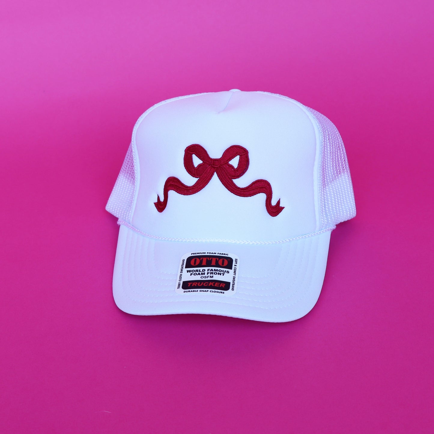 white with crimson bow trucker