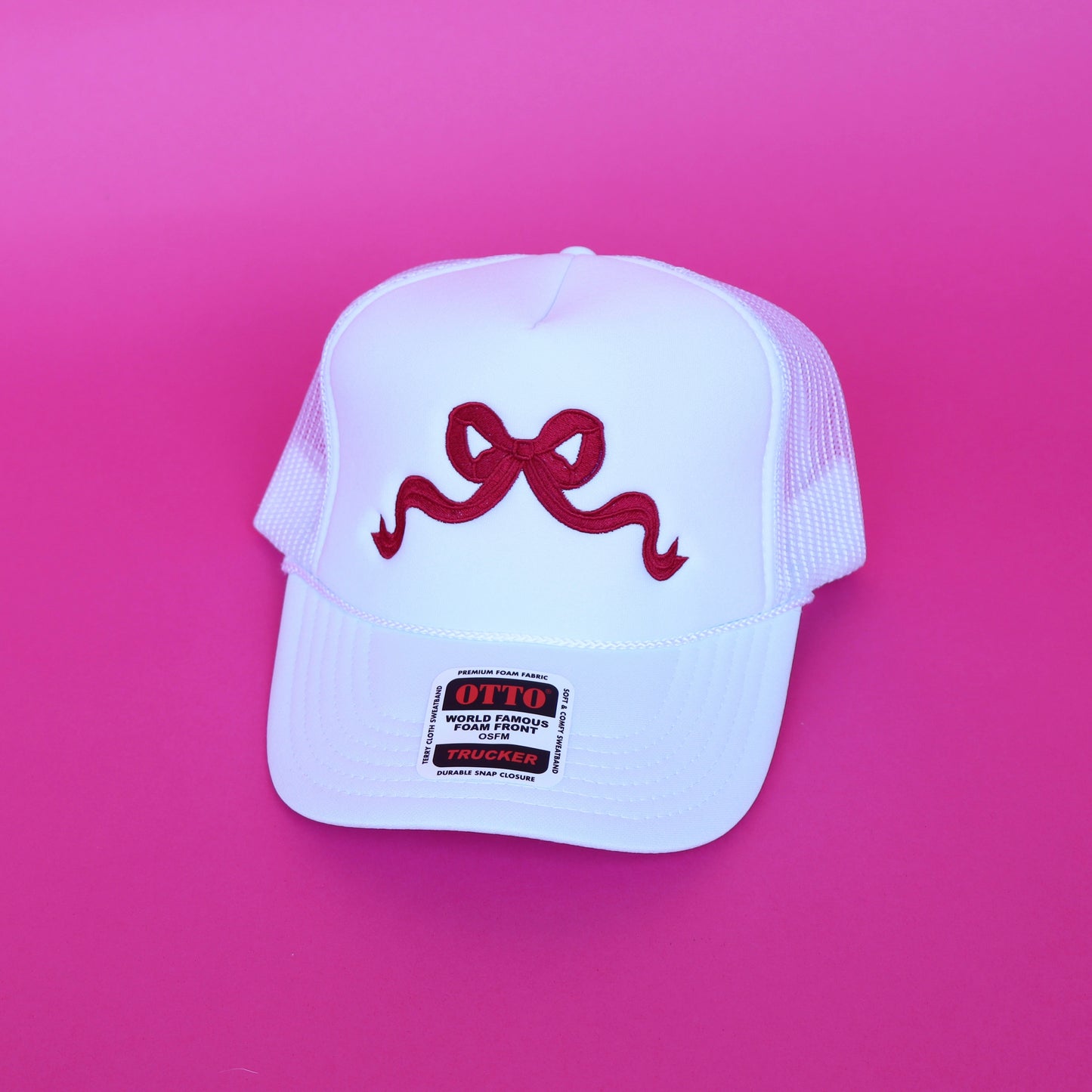 white with crimson bow trucker