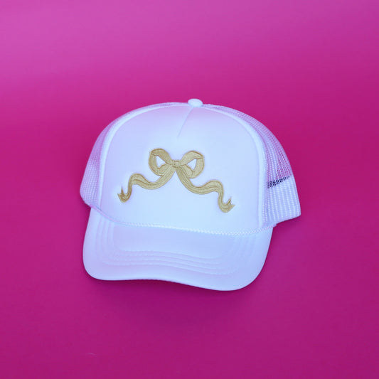 white & gold bow trucker hat