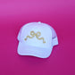 white & gold bow trucker hat